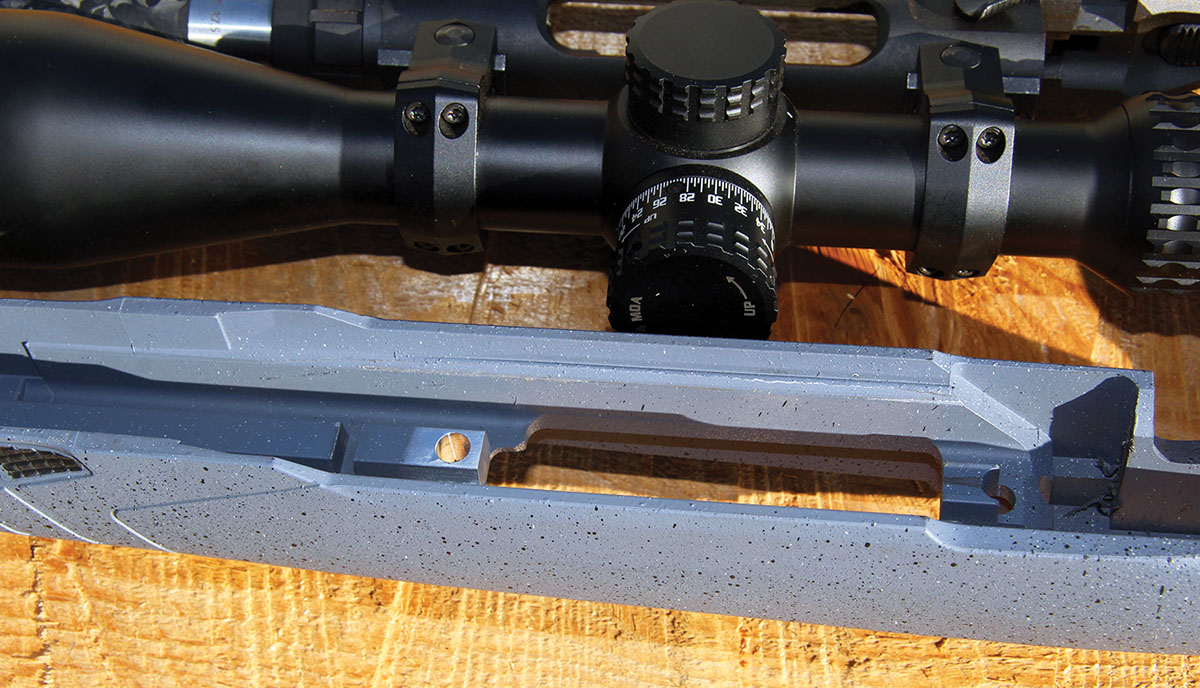 The AccuFit Stock of the Savage 110 Carbon Predator includes an aluminum strip molded into the forend and extending back and beneath the action. The recoil lug notches into a slot milled into this bedding block for excellent stability.